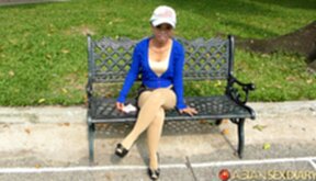 Trinh strips on bed and gets fucked from behind