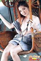 Sitting in seat small breasts exposed