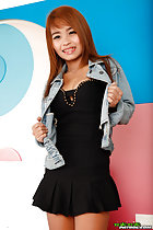 Wearing black dress in denim jacket