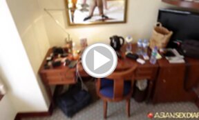 Kim naked in high heels on her knees licking and sucking cock